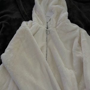 Outside white puffy jacket. Brand new with tags